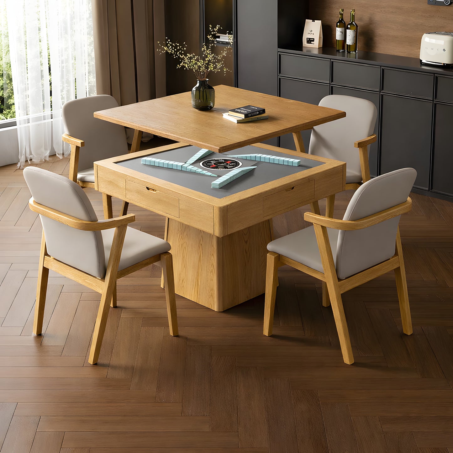 A mid-century modern AUTOJONG automatic mahjong table in  oak, showcasing its convertible design with the wooden tabletop partially lifted to reveal a sleek grey felt playing surface and automatic tile-shuffling mechanism. It is surrounded by four matching beige chairs on a dark wood herringbone floor, highlighting its dual-functionality as both a premium dining table and a high-tech game table.